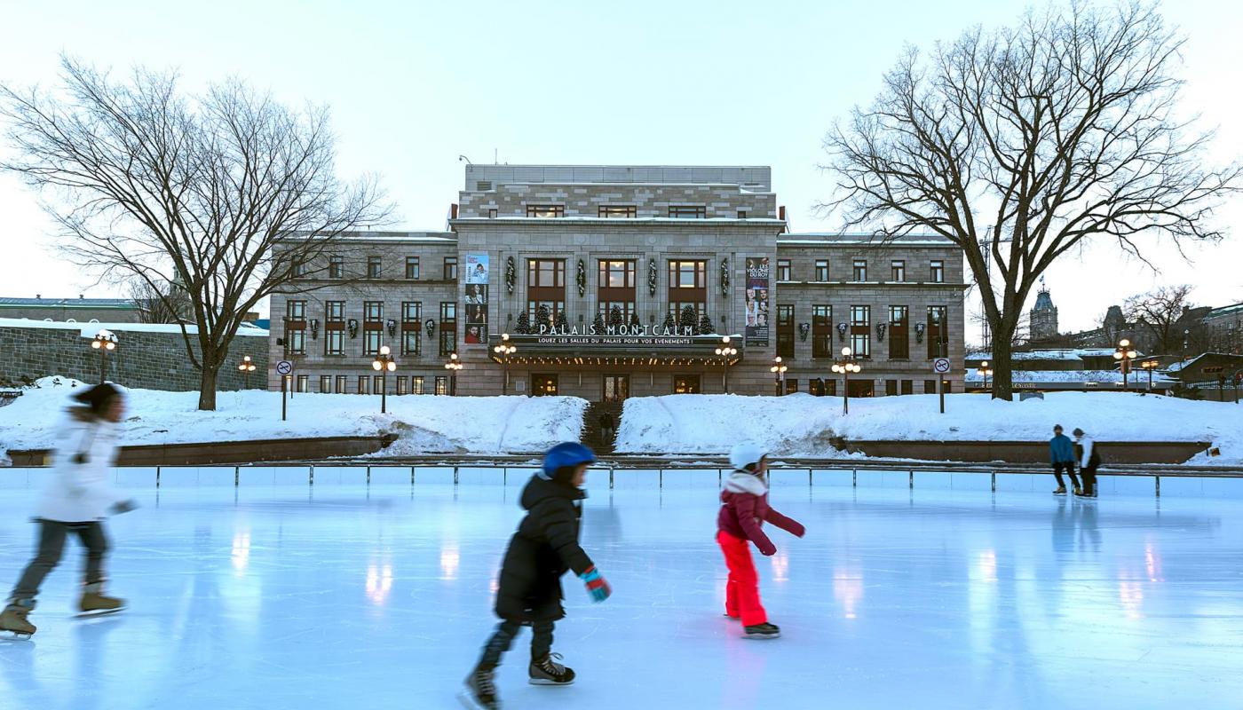 Skaters take advantage of the outdoor rink at Place D'Youville, in front of Palais Montcalm, in Old Québec.