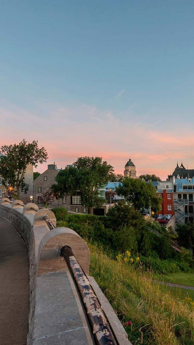 View of the Château Frontenac and avenue Saint-Denis at sunrise, from the Pierre-Dugua-De Mons terrace.