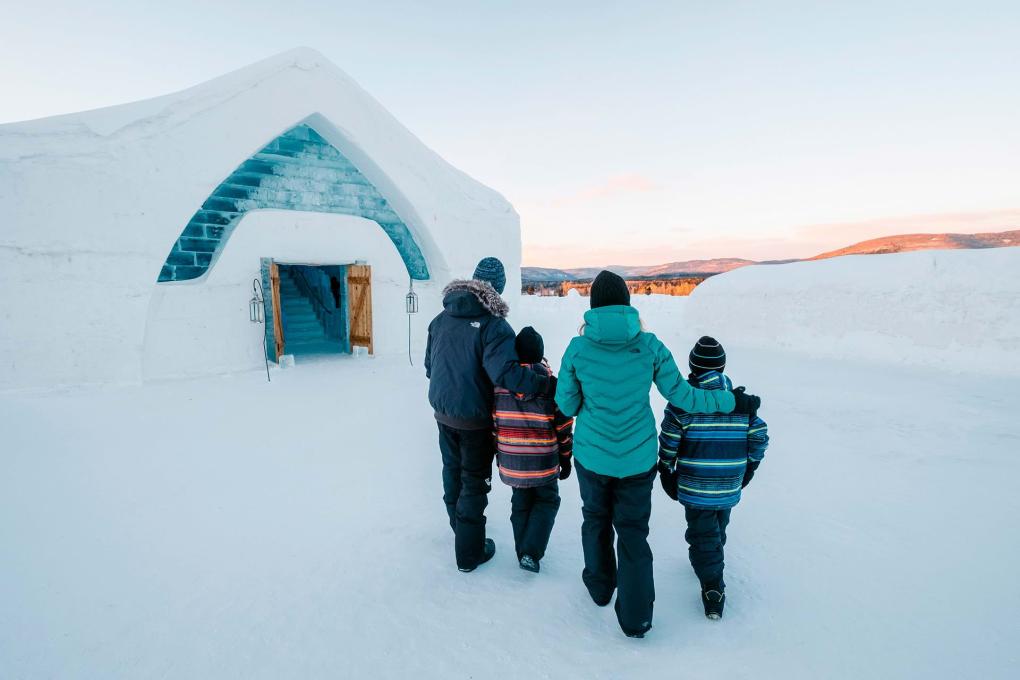 A family entering into the Ice Hotel