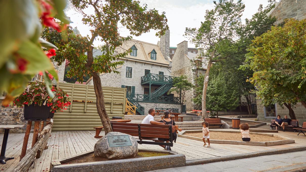 Family in a kid's playground in Old Québec