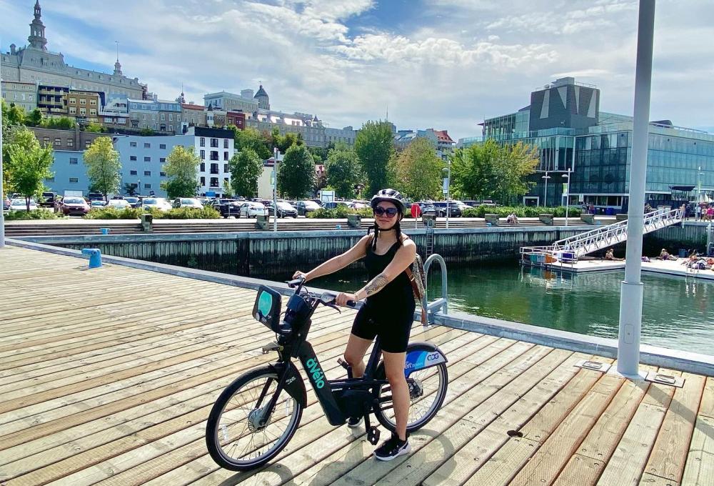 Woman on an electric bike in the Old Port of Quebec