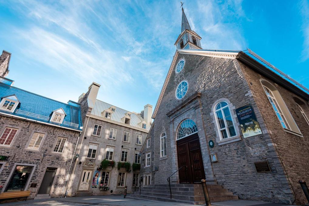 Exterior facade of Notre-Dame-des-Victoires church in the heart of Place-Royale in the Petit-Champlain district.