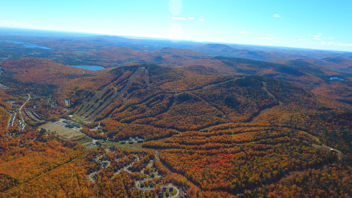 Aerial view of Stoneham Ski Resort in autumn.