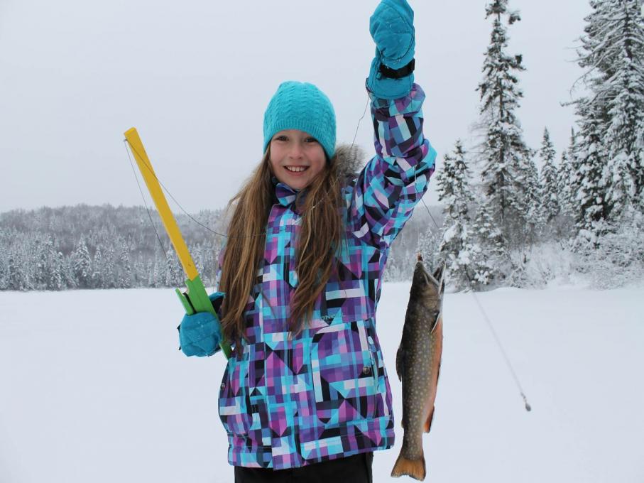 Young girl ice fishing in the Portneuf Wildlife Reserve.