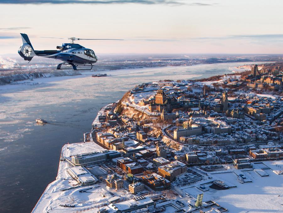 GoHelico - vue aérienne du Vieux-Québec en hiver avec un hélicoptère