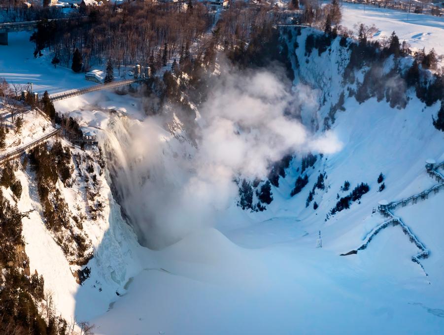GoHelico - aerial view of the Montmorency Falls in winter