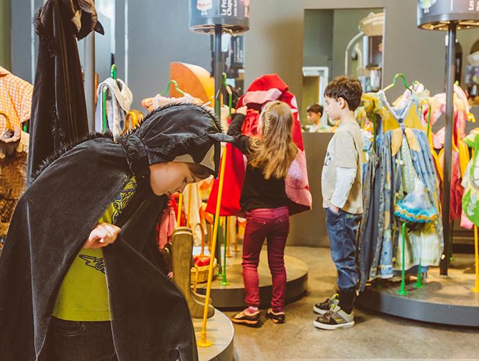 Children have fun in the costume workshop at the Musée de la civilisation.