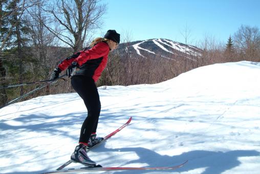 A woman cross-country skiing at Mont-Sainte-Anne, in the Côte-de-Beaupré region, near Québec City.