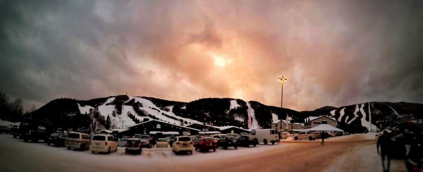 The parking lot and the mountain at Stoneham Ski Resort, at the end of the day.