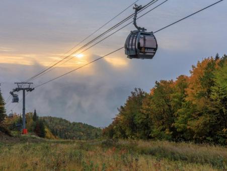 View of a cable car in the Massif de Charlevoix in the fall.