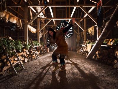 A Native American dancer performs a traditional dance inside the longhouse in Wendake, near Québec City.