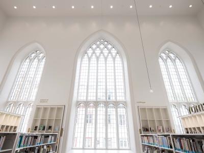 Interior windows of the bright Maison de la Littérature.