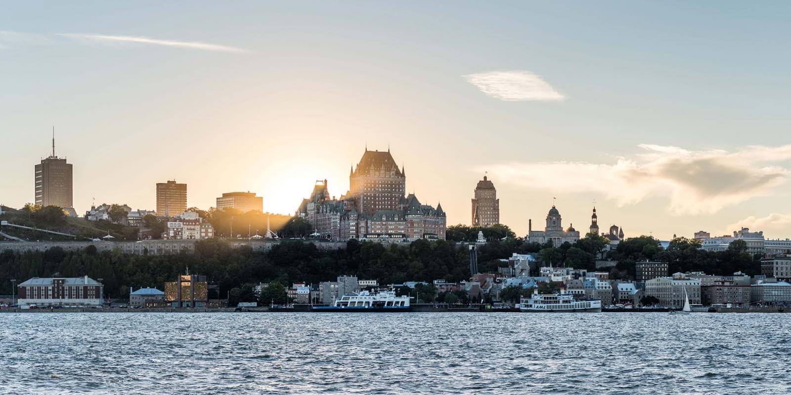 Sunset and panoramic view of Old Québec, from Lévis in summer.