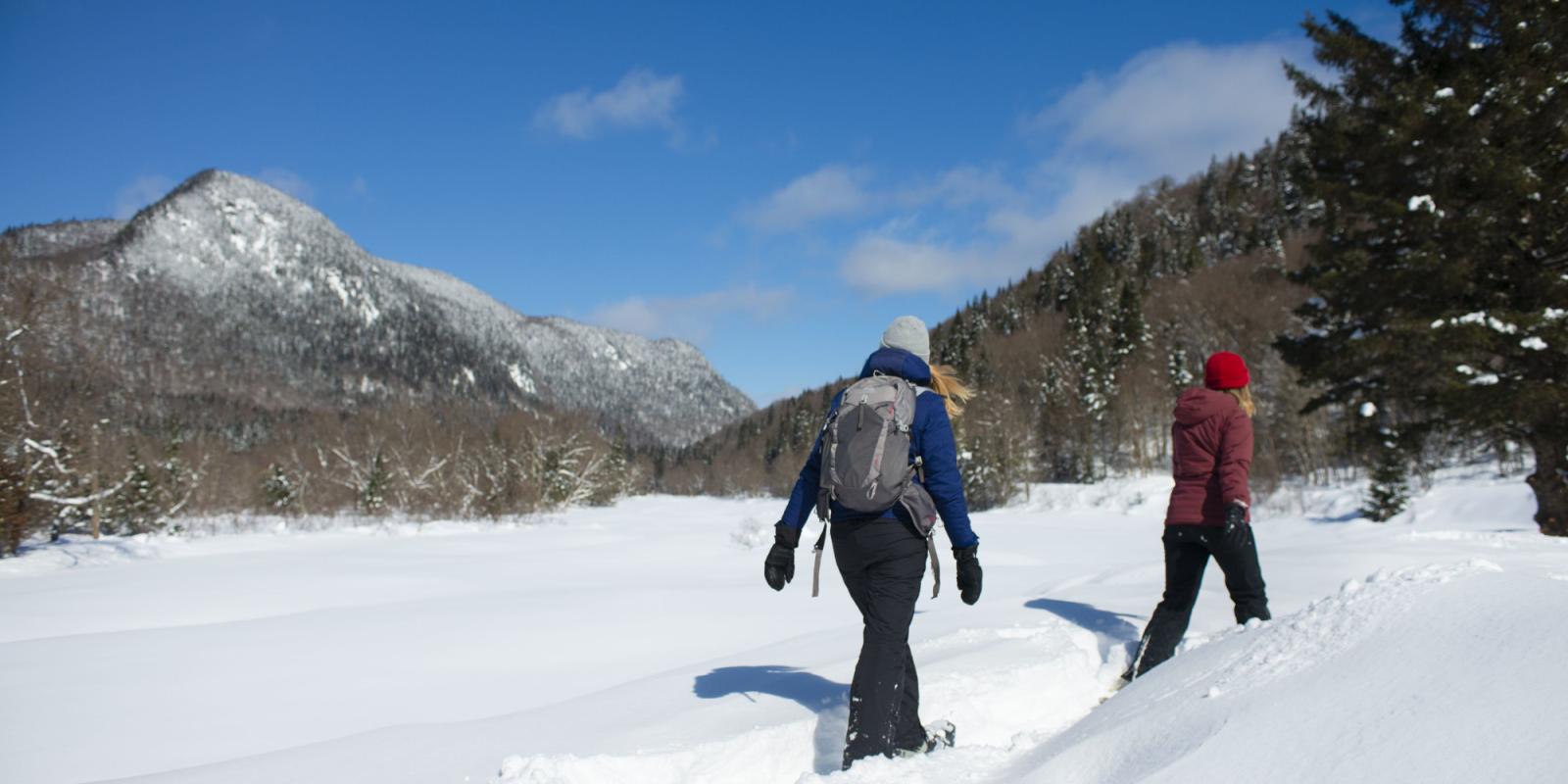 Two girls on snowshoes in Jacques-Cartier National Park
