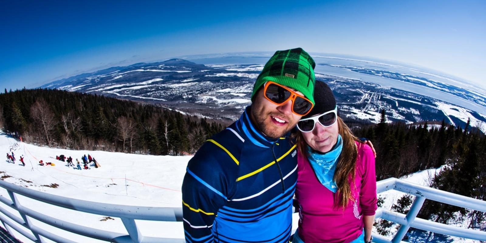 Couple at Mont-Sainte-Anne in spring skiing