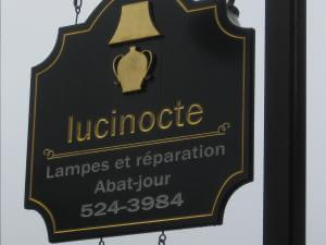 Lucinocte 1985 Sign
