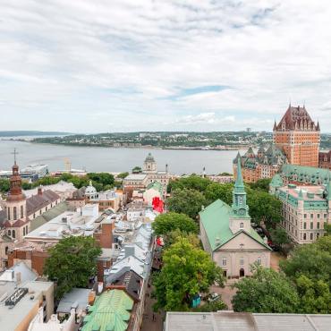 Aerial view of Old Québec, Holy Trinity Church, Notre-Dame de Quebec Basilica-Cathedral and Château Frontenac.