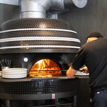 Wood-fired oven at Nina Pizza Napolitaine