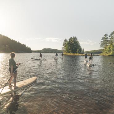 O Pagaie - paddle boards on a lake